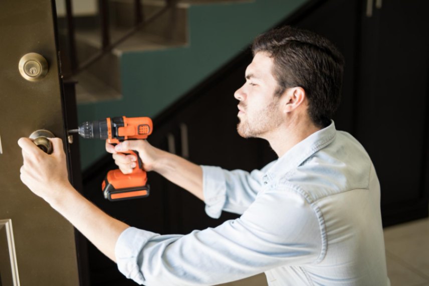 A person working on door repair